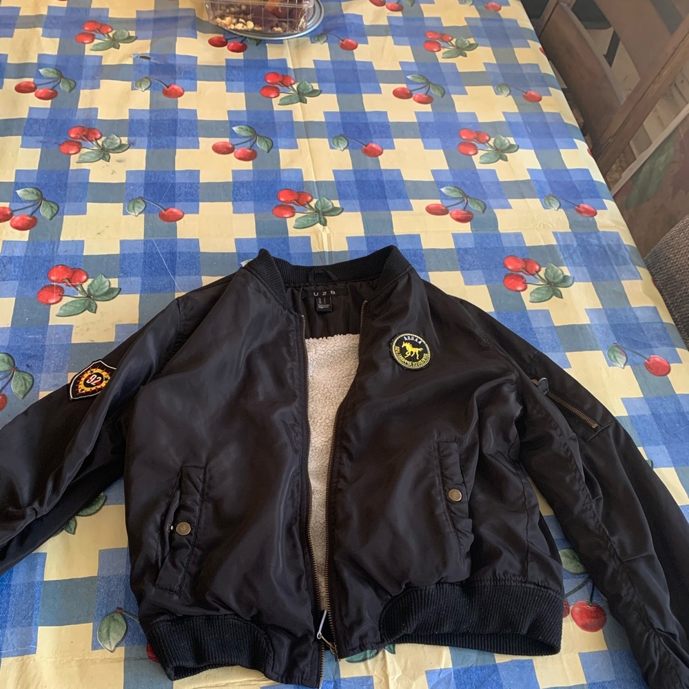 A black puffy bomber jacket